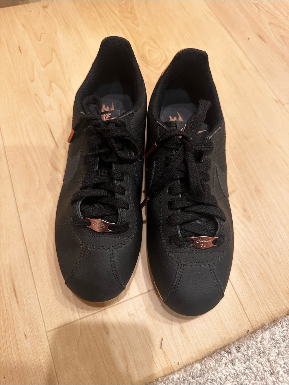 Women’s Cortez Nike Black Sneakers with Rose Gold Accents